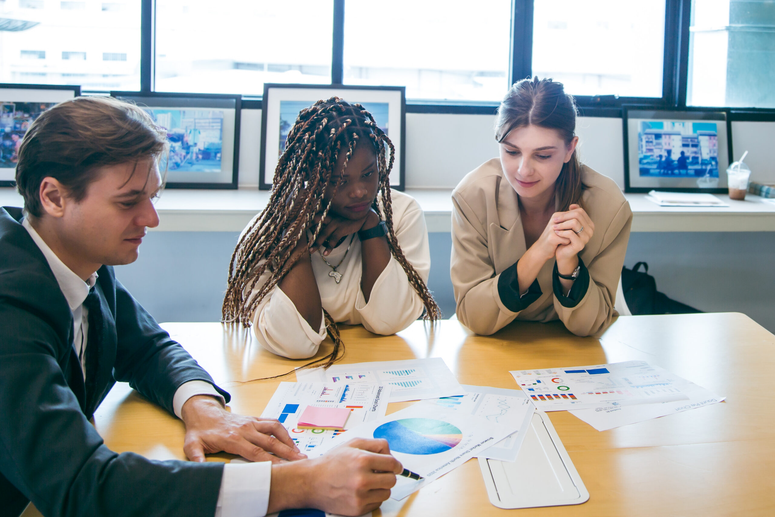 A marketing team discussing their brand management plan for their client.